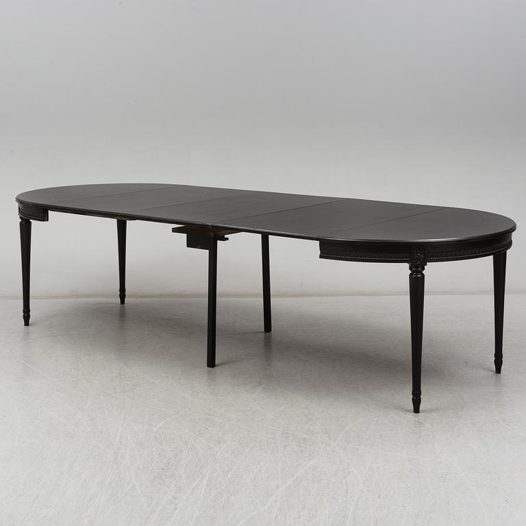 A late 20th Century painted table.