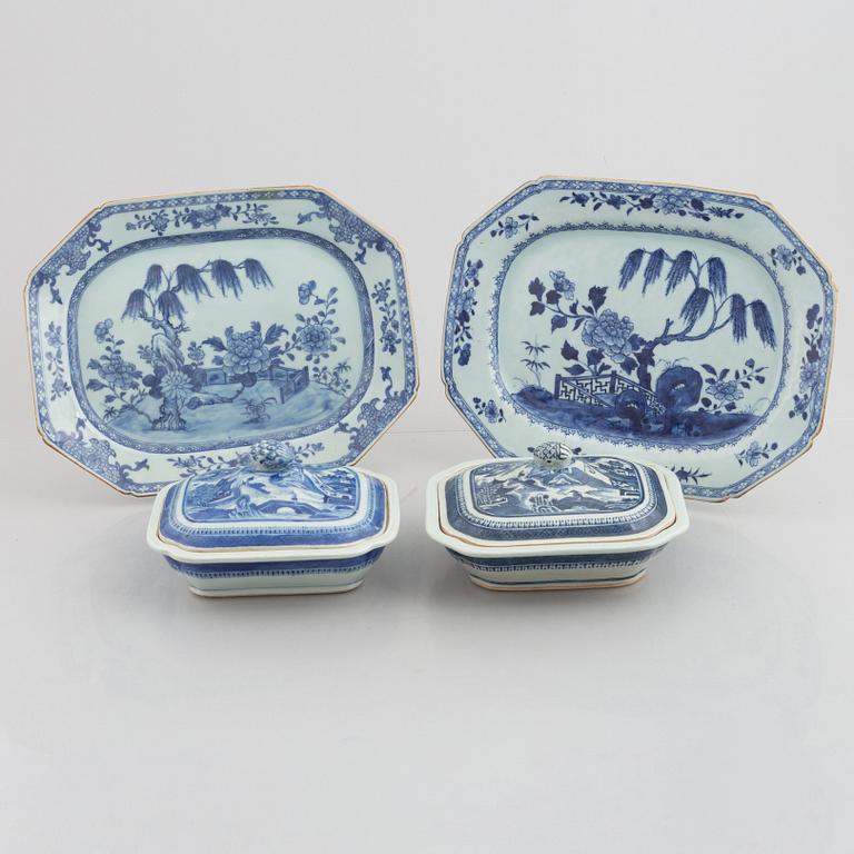 A pair of Chinese porcelain vegetable dishes with covers and two dishes, Qing dynasty, 18th and 19th century.