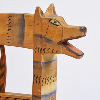 Gérard Rigot, a sculpted and painted oak chair, exectued in his studio, France, second half of the 20th century.