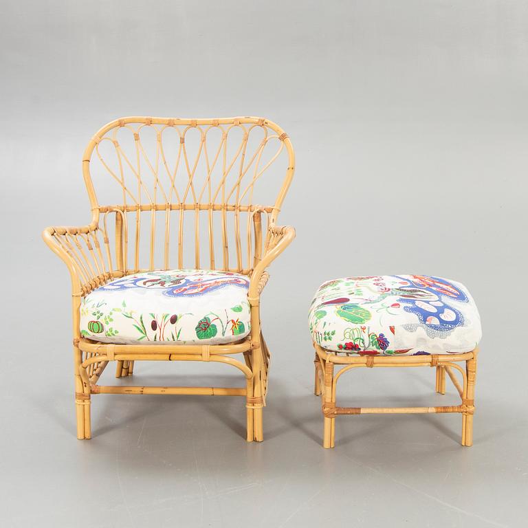 Josef Frank, Armchair with footstool, Firma Svenskt Tenn, model 311.