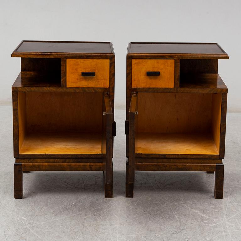 A pair of 1930s bedside tables.