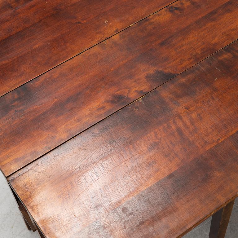 Two gate-leg tables from the first half of the 20th century.
