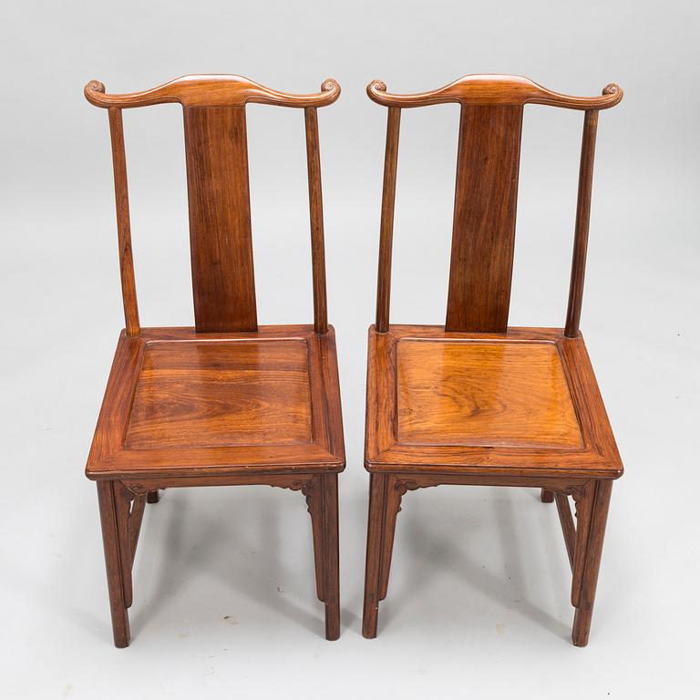 A pair of  20th Century hardwood Chinese 'Hat Chairs'.