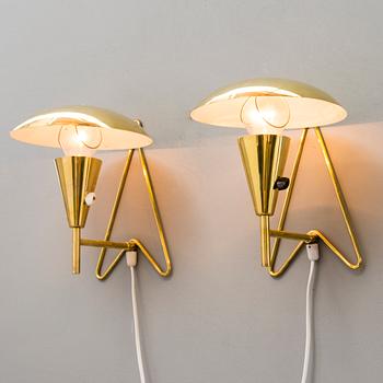 A pair of mid-20th-century wall lights / table lamps, model EV 57 for Itsu, Finland.