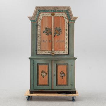 A painted Swedish provincial cabinet from Jämtland, dated 1849.