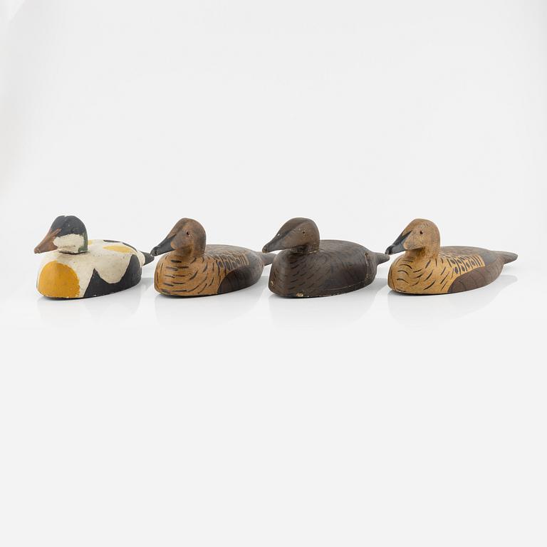 Four wooden decoy ducks, 20th century.