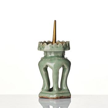 A rare celadon lamp, Ming dynasty (1368-1644).