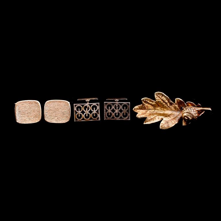 MANSCHETTKNAPPAR, 2 par samt BROSCH, silver, 1900-tal. Vikt ca 29 gram.