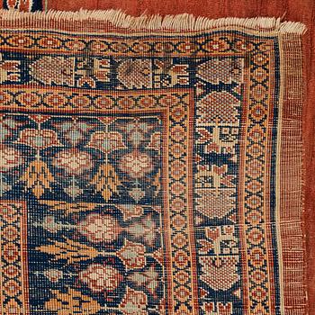 A rug, an antique silk Heriz, ca 166,5-170 cm x 116-120 cm.