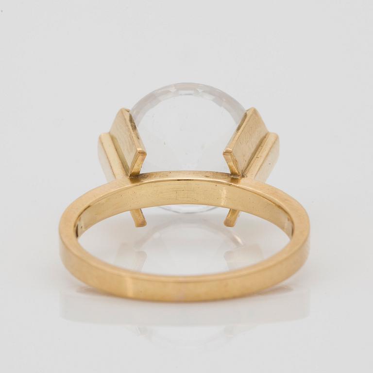 Wiwen Nilsson, an 18k gold ring with a facet cut rock crystal, Lund 1962.