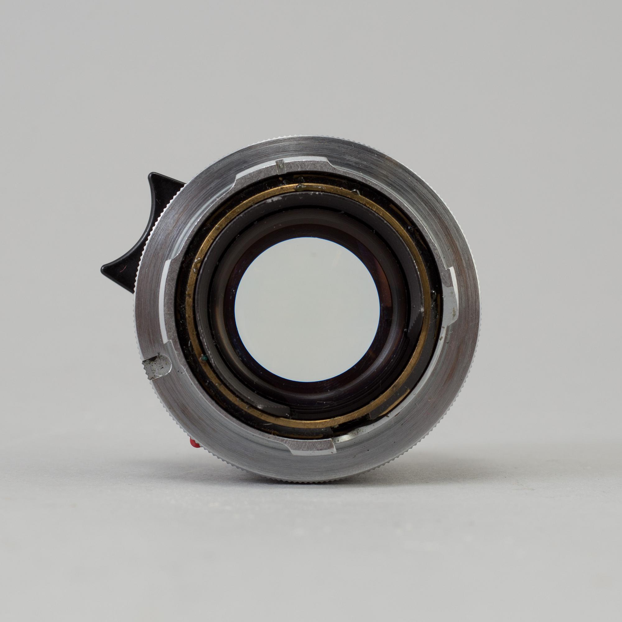 A black Leica Summilux 1:1.4 /35 Leitz  Lens no 2391303, Canada.