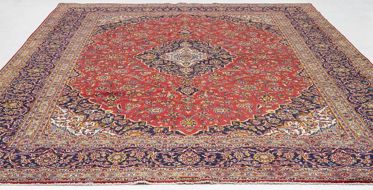 A Keshan carpet, central Iran, signed c, 392 x 301 cm.