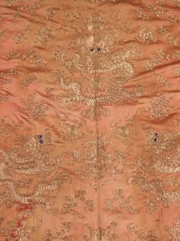 A ROBE, embroidered silk, height 131 cm, China late Qing dynasty (1644-1912).