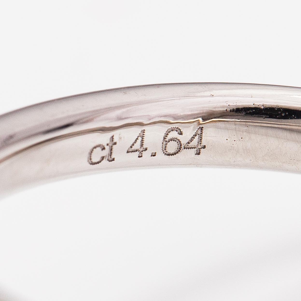 An 18K white gold ring with an opal ca. 4.64 ct and diamonds ca. 0.35 ct in total according to certificate.