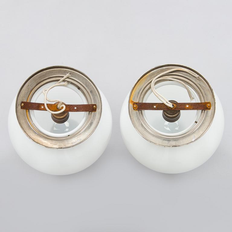 A pair of 1930s ceiling lights.