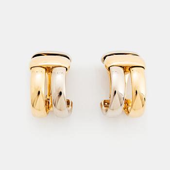 391. A pair of Hermès earrings in 18K gold and white gold.