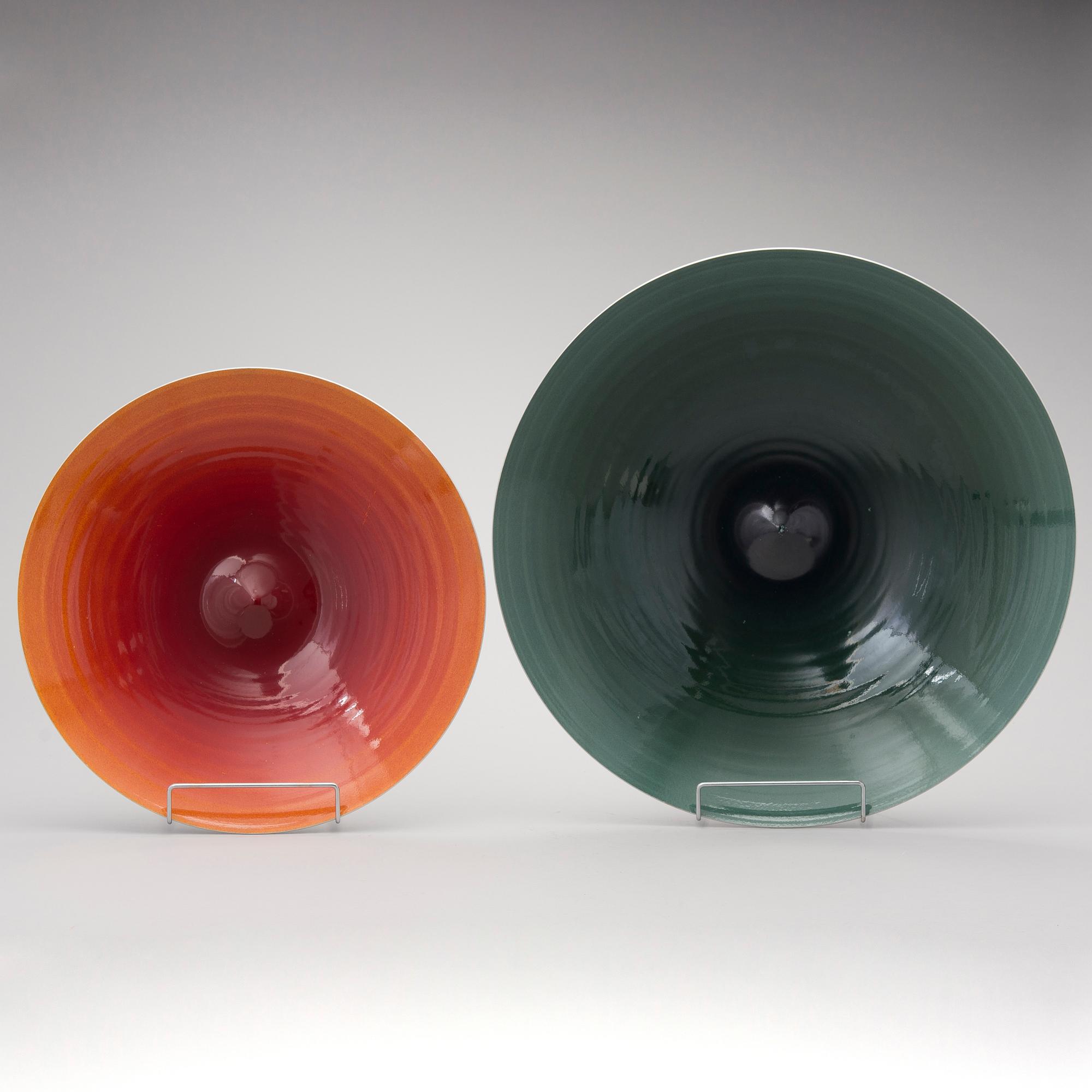 A pair of late 20th Century enameled aluminium 'Tuuli' bowls by Brita Flander, Hackman, Finland.