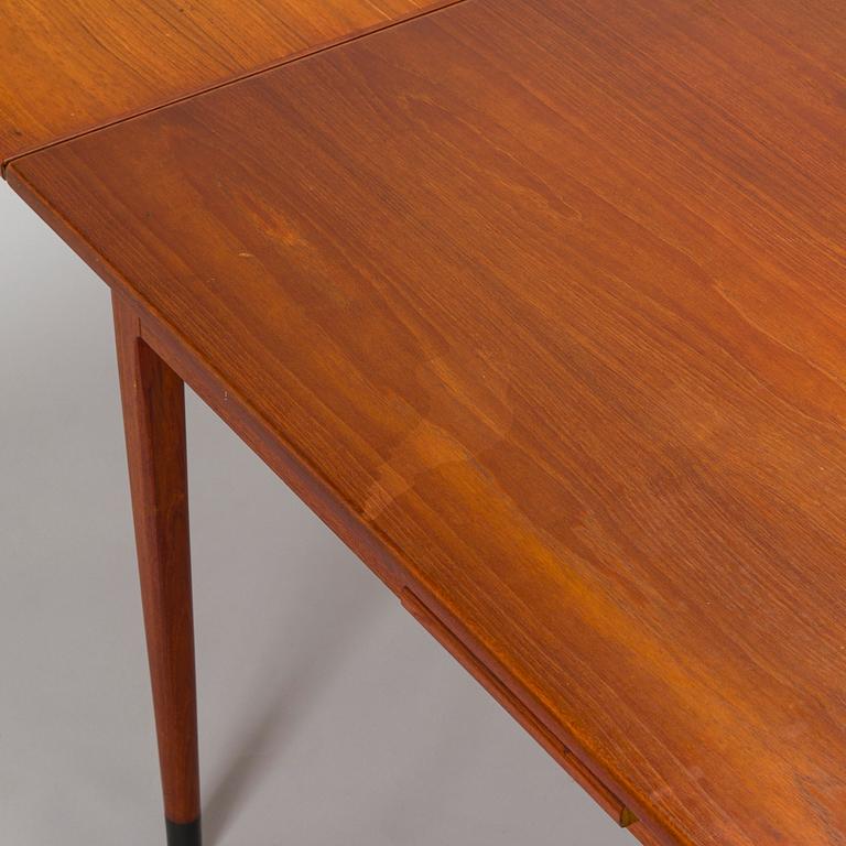 A mid 20th century dining table Niels O. Møller, J.L. Møllers Møbelfabrik, Denmark.