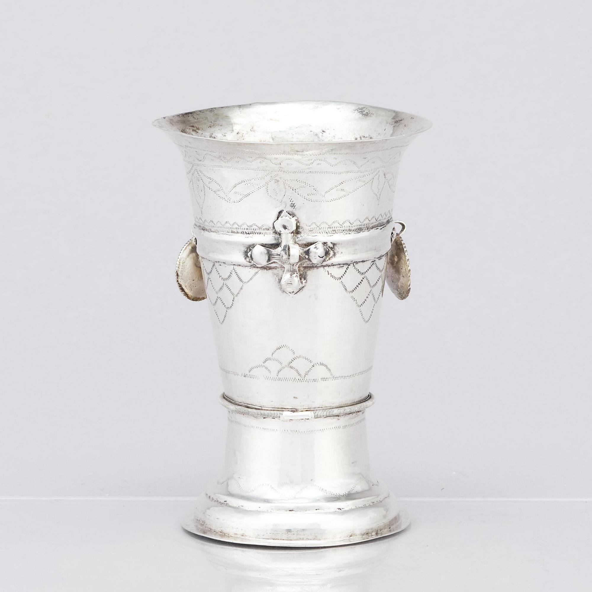 An 18th century silver beaker, unidentified makers mark.