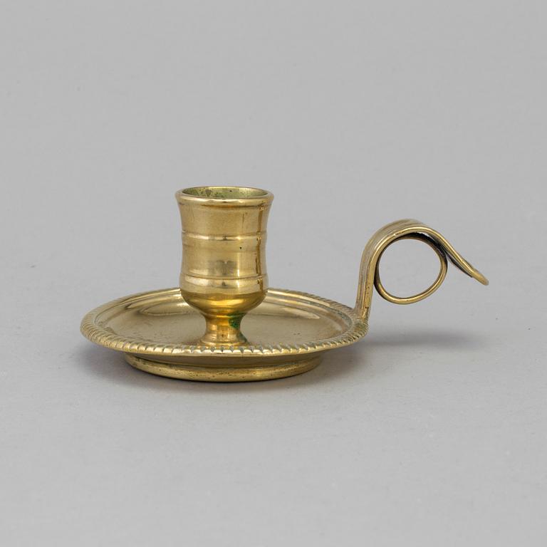 AN 18TH CENTURY BRONZE NIGHT LIGHT.