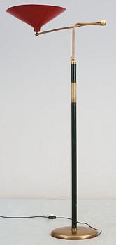 An Italian brass and leather floor lamp, Arredoluce, circa 1950, red lacquered tin shade.