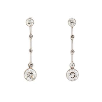 417. A pair of 18K white gold earrings set with old-cut diamonds.