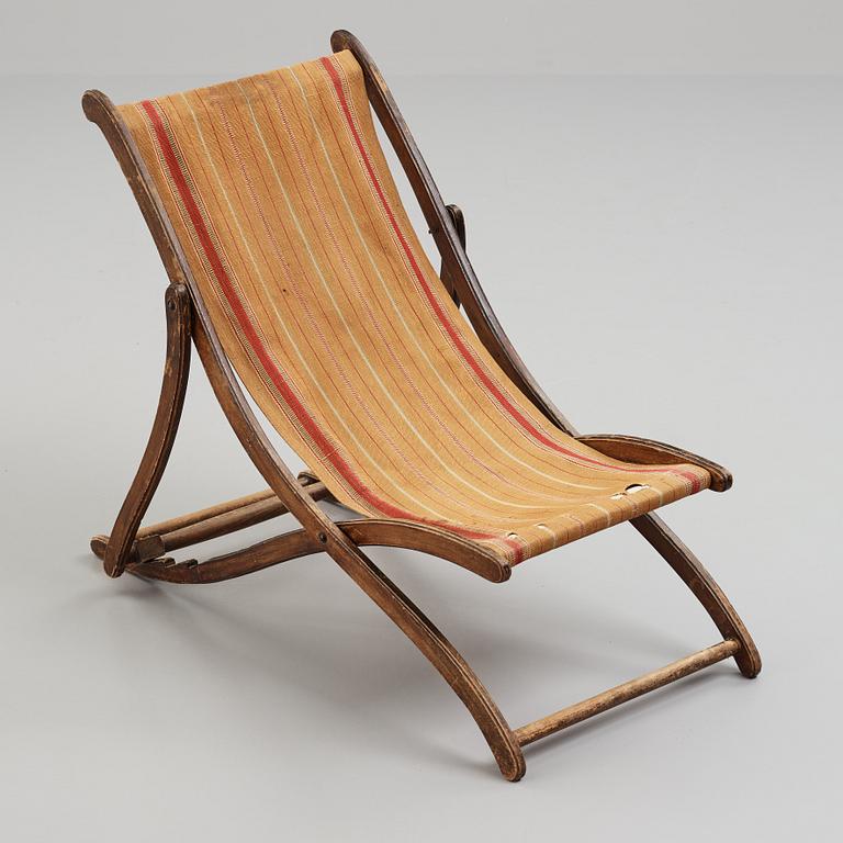 An early 20th century deck chair.
