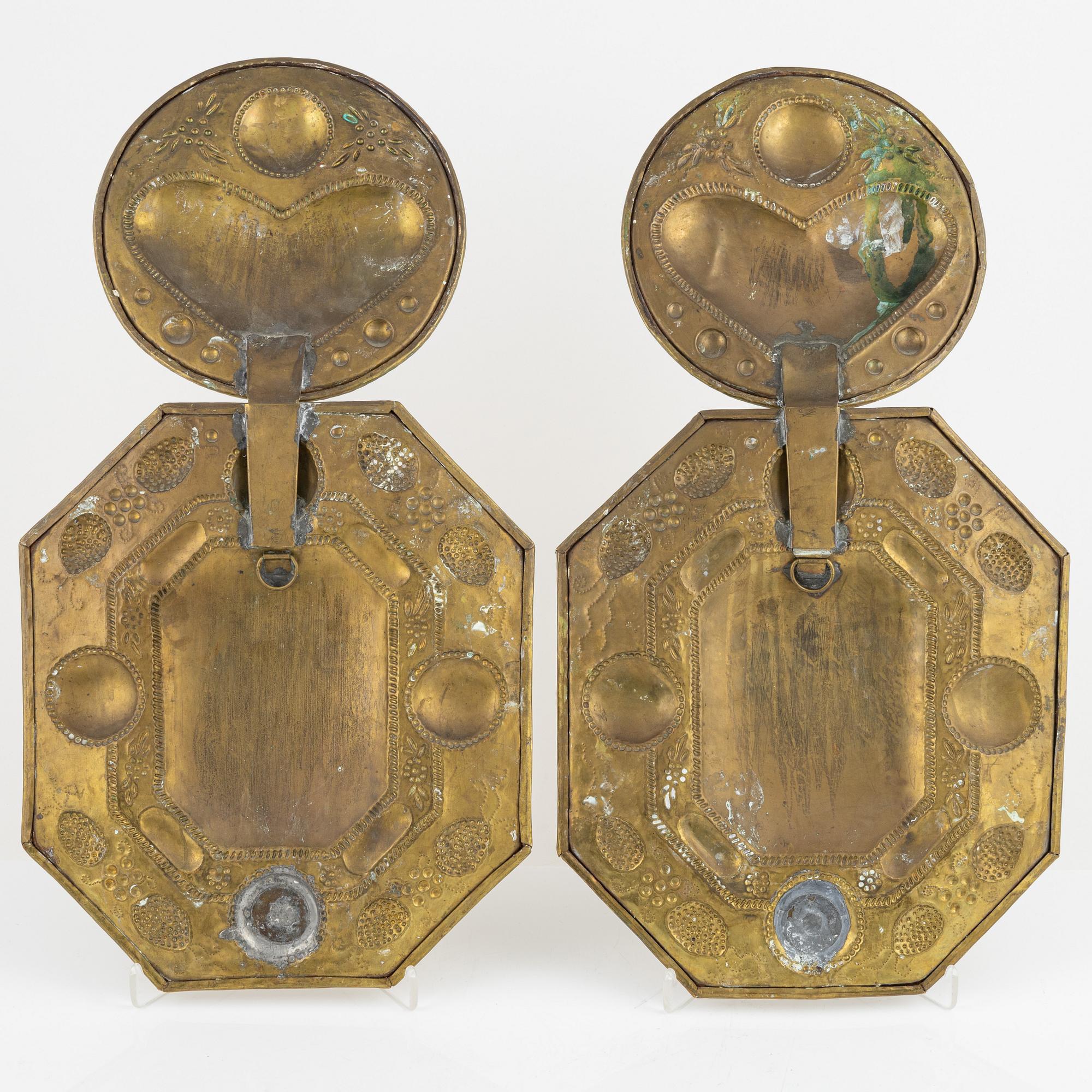 A pair of baroque style brass sconces, around 1900.