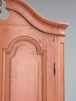 A rococo corner cabinet, later part 18th century.
