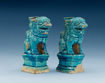 1470. A pair of turquoise glazed censers in the shape of seated fable figures, Ming dynasty (1368-1644).