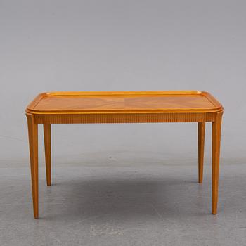 An elm Swedish Modern coffee table, dated 11 11 1947.