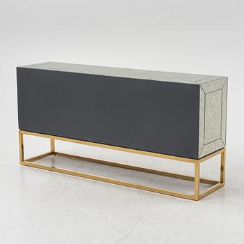 Jonathan Adler, a 'Delphine' mirror credenza.