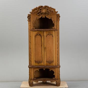 KNUT FJAESTAD, a folk art oak cabinet, signed KF 1935.