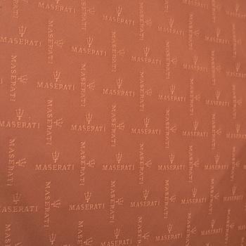 Maserati, five pieces of 'Quattroporte' leather luggage.