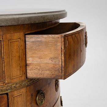 A Louis XVI style chest of drawers, 19th century.