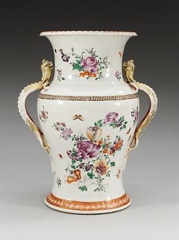 A famille rose floral baluster vase, Qing dynasty, circa 1800.