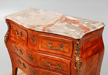 A rococo style chest of drawers, around the mid 20th century.
