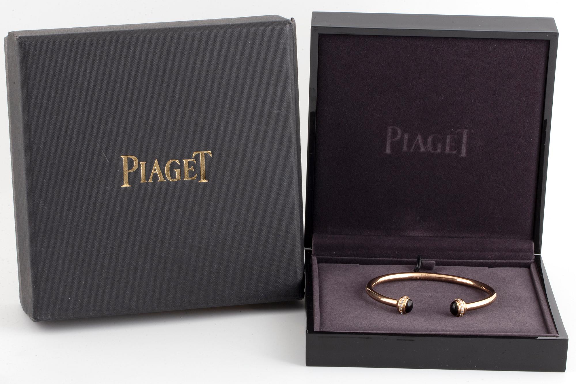 Piaget 18K rose gold, brilliant-cut diamonds and onyx cabochons.