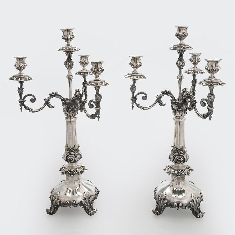 A pair of silver candelabra, maker marks of Carl Johan Tegelsten, Saint Petersburg 1850.