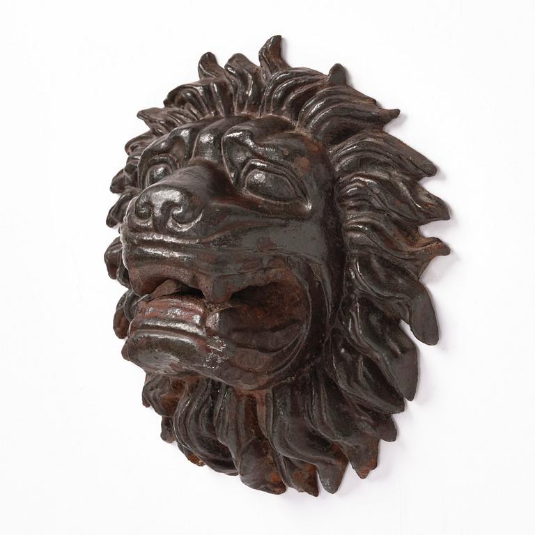 Anna Petrus, a cast iron mascaron in the shape of a lion's head, Näfveqvarns bruk, ca 1927, Swedish Grace.