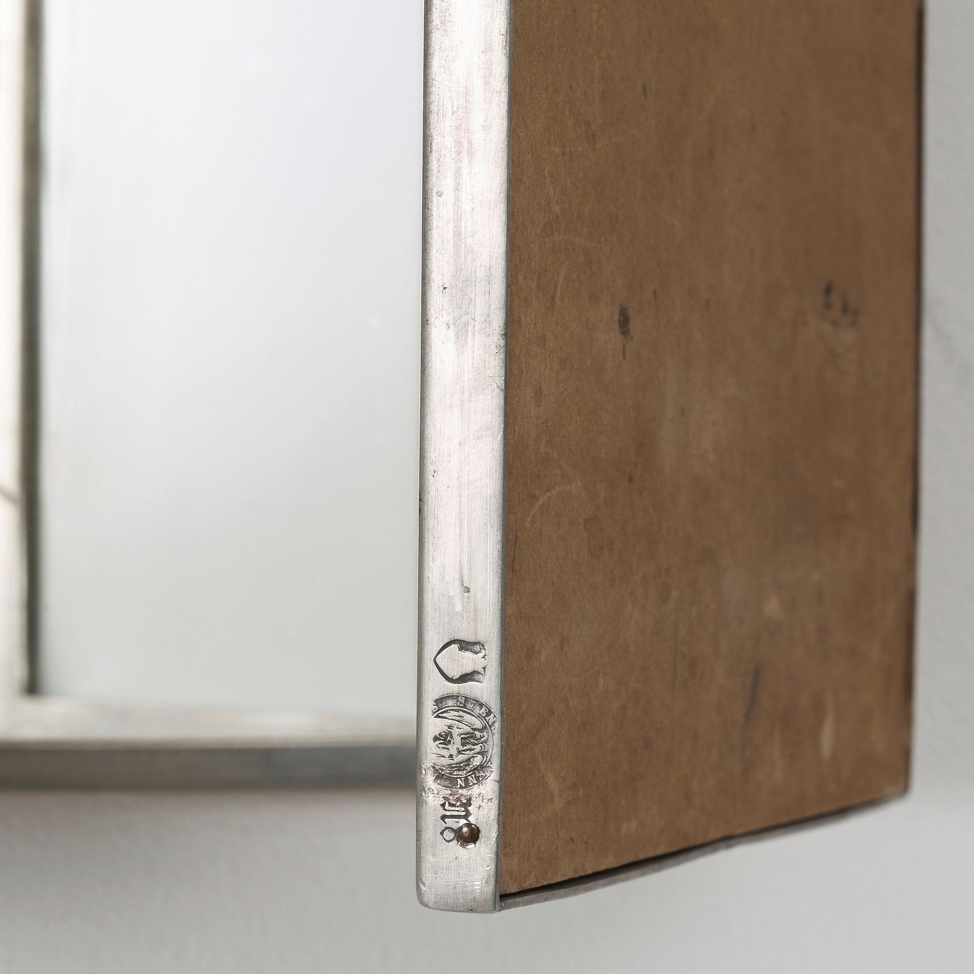 Estrid Ericson, A pewter three-piece mirror, Svenskt Tenn, Stockholm 1939, model 884.