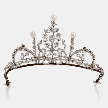 877. A platinum tiara/necklace combination set with old-cut diamonds and pearls.