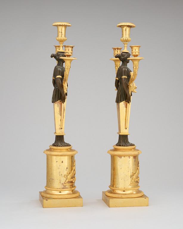 A pair of Swedish Empire early 19th century three-light candelabra.