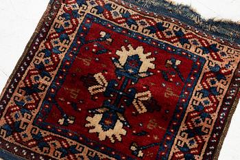 An Antique Saddlebag, so-called Heybe, Anatolia, c. 47 x 45 cm.