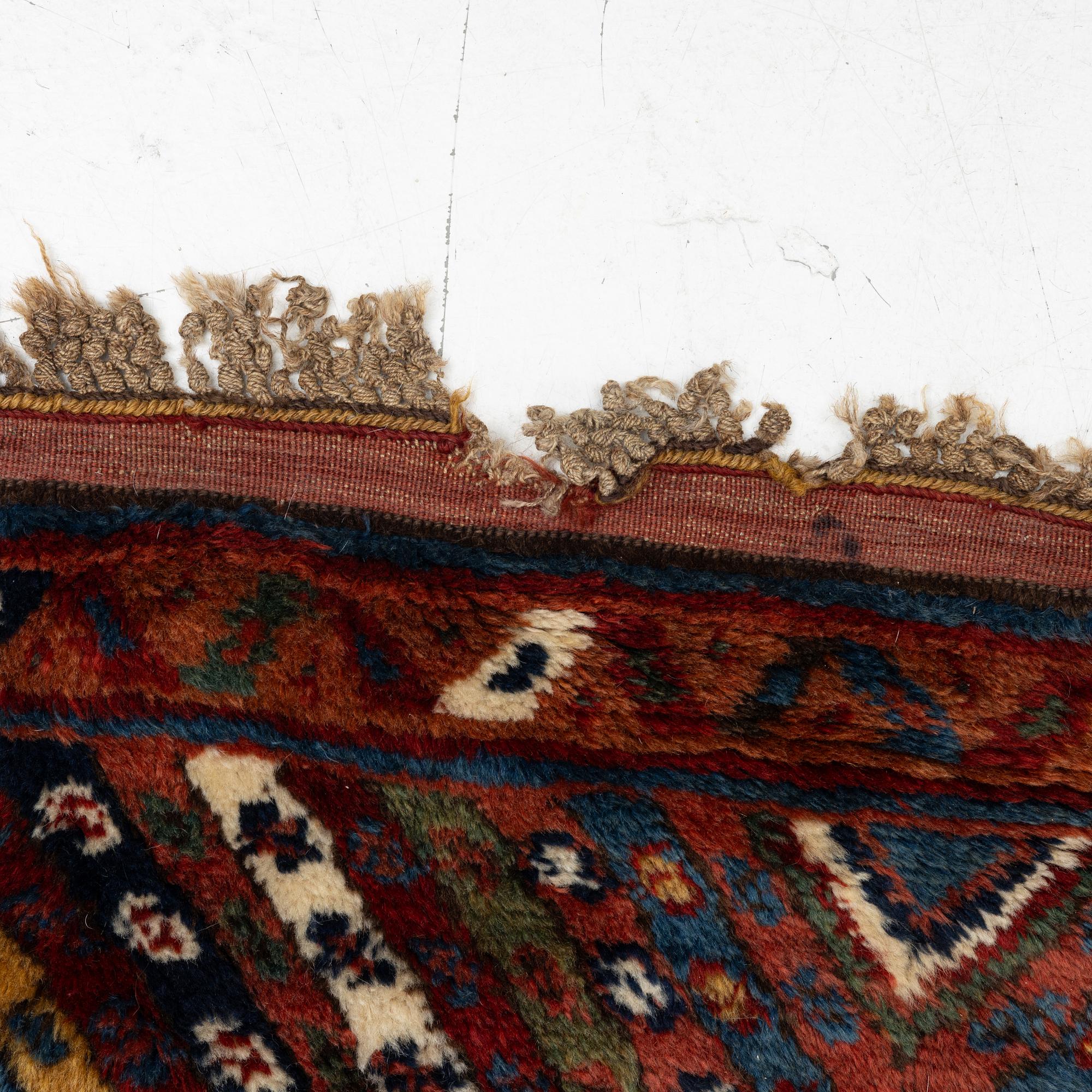 An antique Sauj Bulag runner, Eastern Kurdistan, c. 360 x 155.