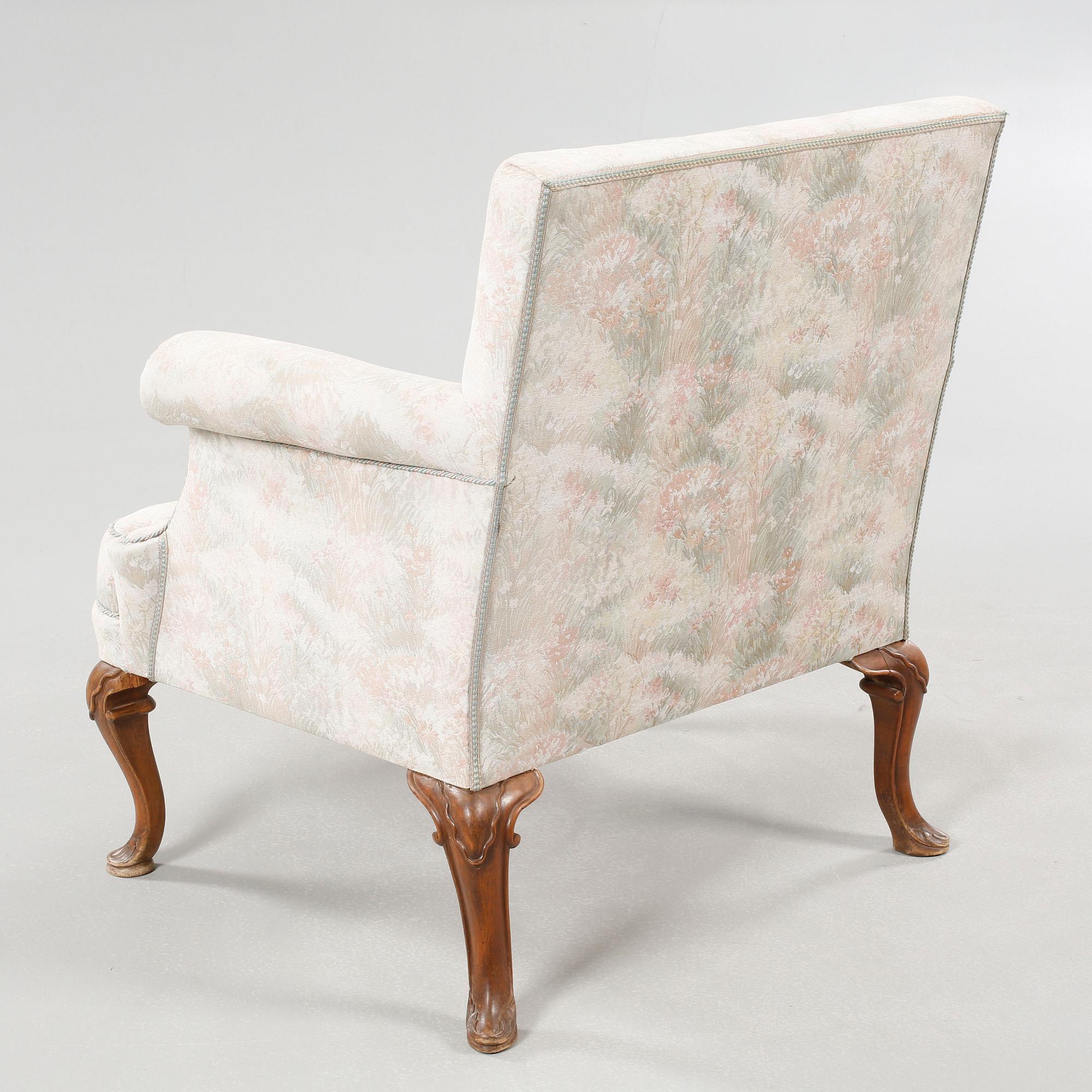 A Queen Anne style armchair, early 20th century.