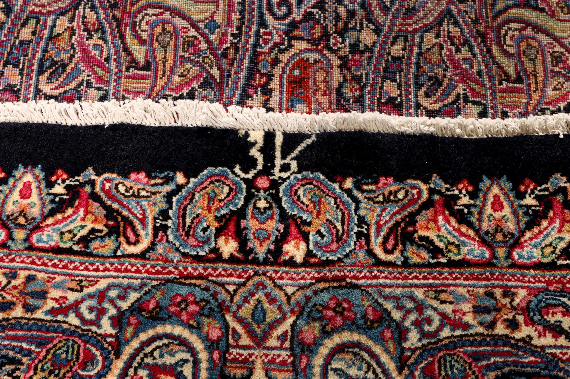 A Boteh pattern Kerman carpet, c. 475 x 342 cm.