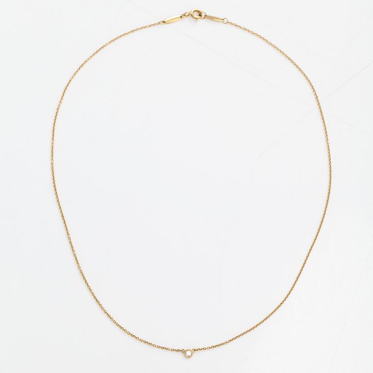 Tiffany & Co, Elsa Peretti, an 18K gold necklace with a ca. 0.05 ct  diamond. Marked Tiffany & co, Peretti.