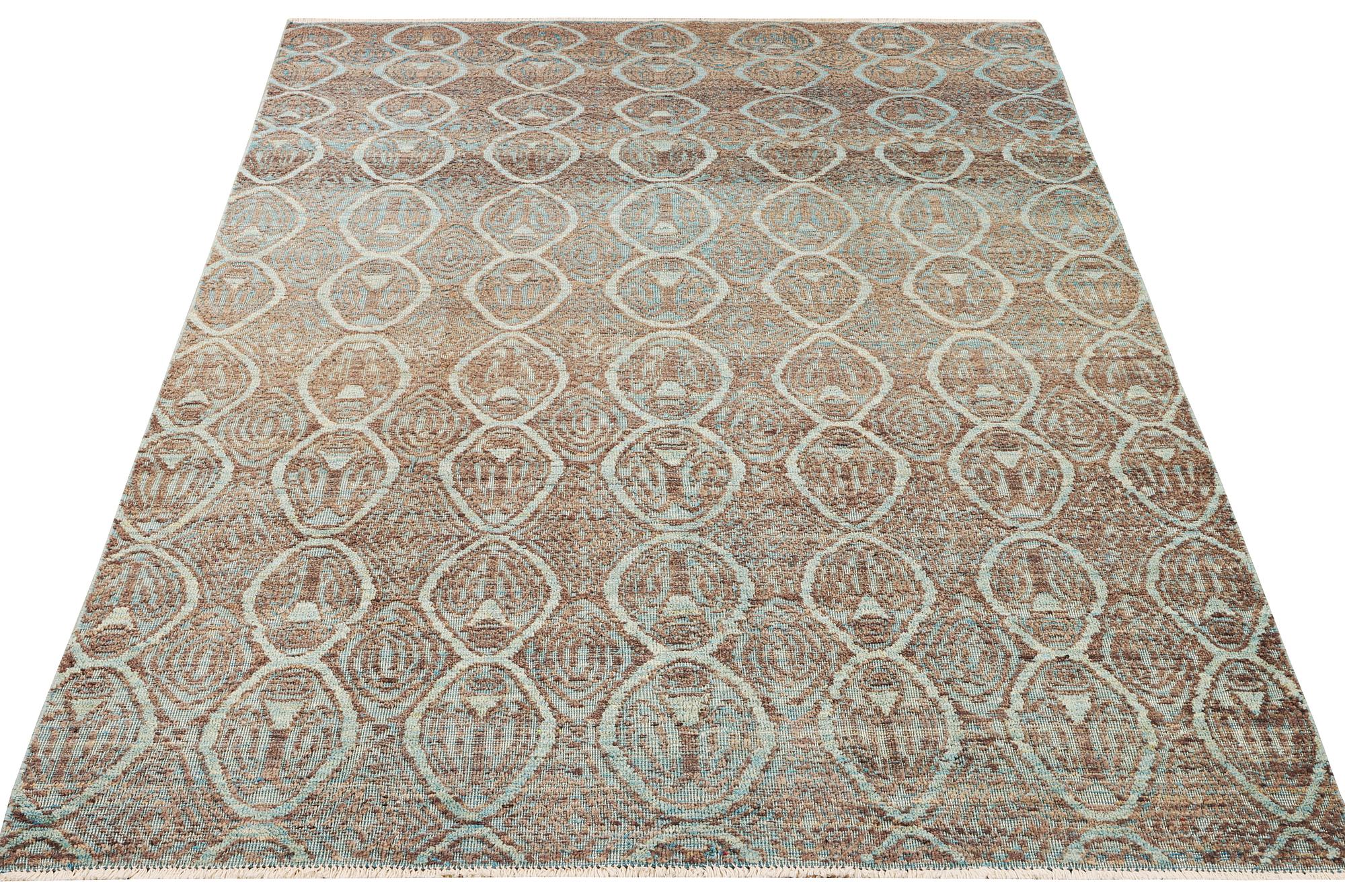 An oriental carpet with modern design, c. 308 x 202 cm.