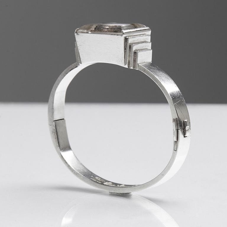 Wiwen Nilsson, a sterling bangle with a facet cut rock crystal, Lund, Sweden 1966.